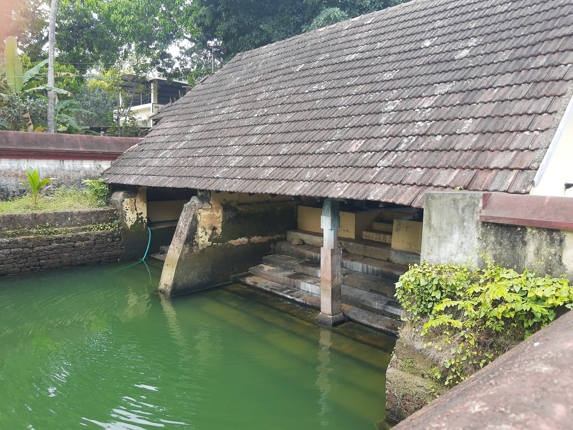 A boathouse on the backwaters — the waterways that once carried Kerala's spice trade.